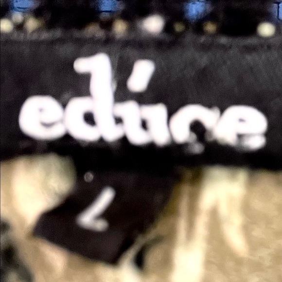 Edure White & Blk Ruffle top! Each row ruffles! It's a Large & has some Stretch - Picture 3 of 3